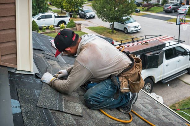 Professional Roofing technician working in Larwill, IN